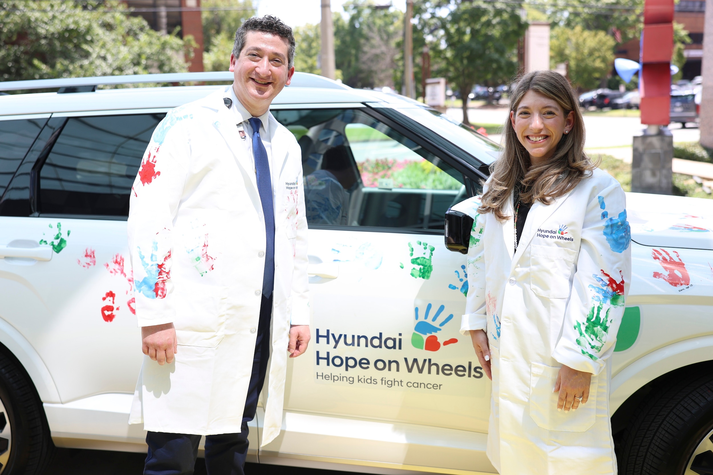 Hyundai Hope on Wheels handprint vehicle covered in colorful children's handprints at Monroe Carell Jr. Children's Hospital at Vanderbilt