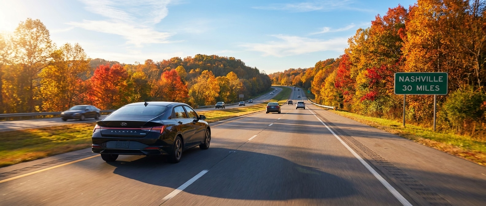 2026 Hyundai Elantra Hybrid on a Tennessee highway commute in October fall foliage