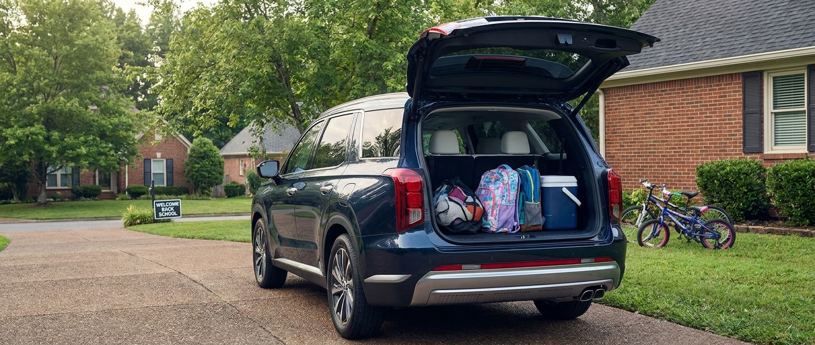 2026 Hyundai Palisade with open liftgate loaded with school bags in a Hendersonville, TN driveway