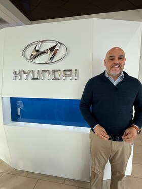 Staff member Johnny Velazquez from ID_839459