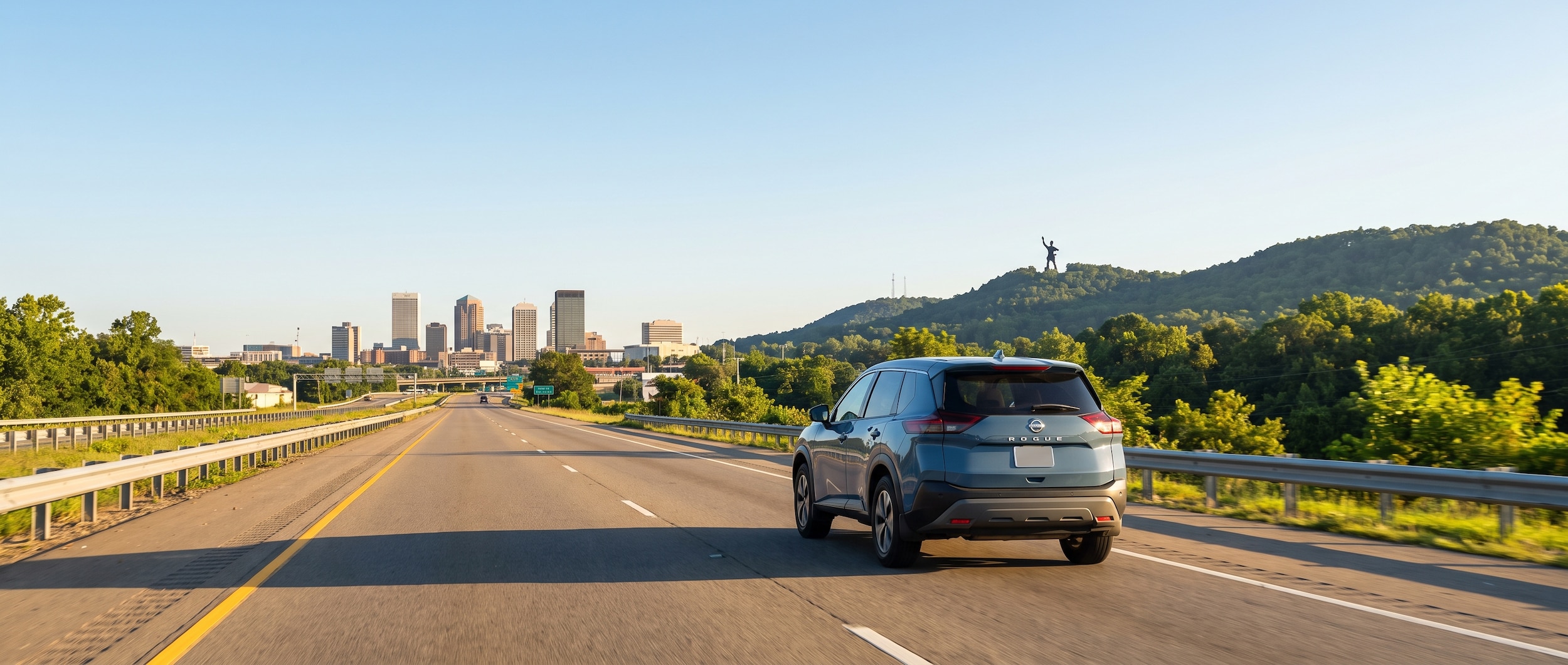 2026 Nissan Rogue on I-65 North approaching downtown Birmingham from Vestavia Hills on a sunny morning