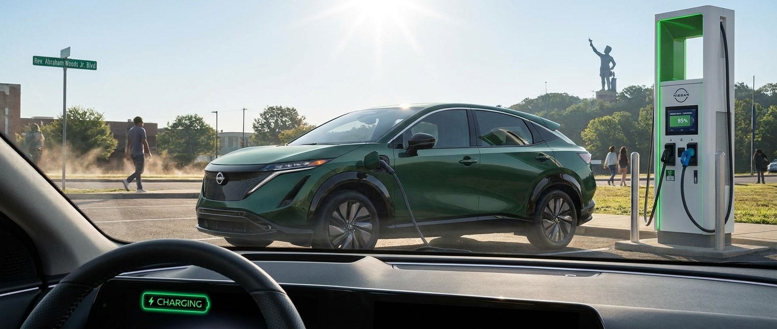 2025 Nissan Ariya plugged into a CCS DC fast charger in Birmingham, Alabama on a summer day