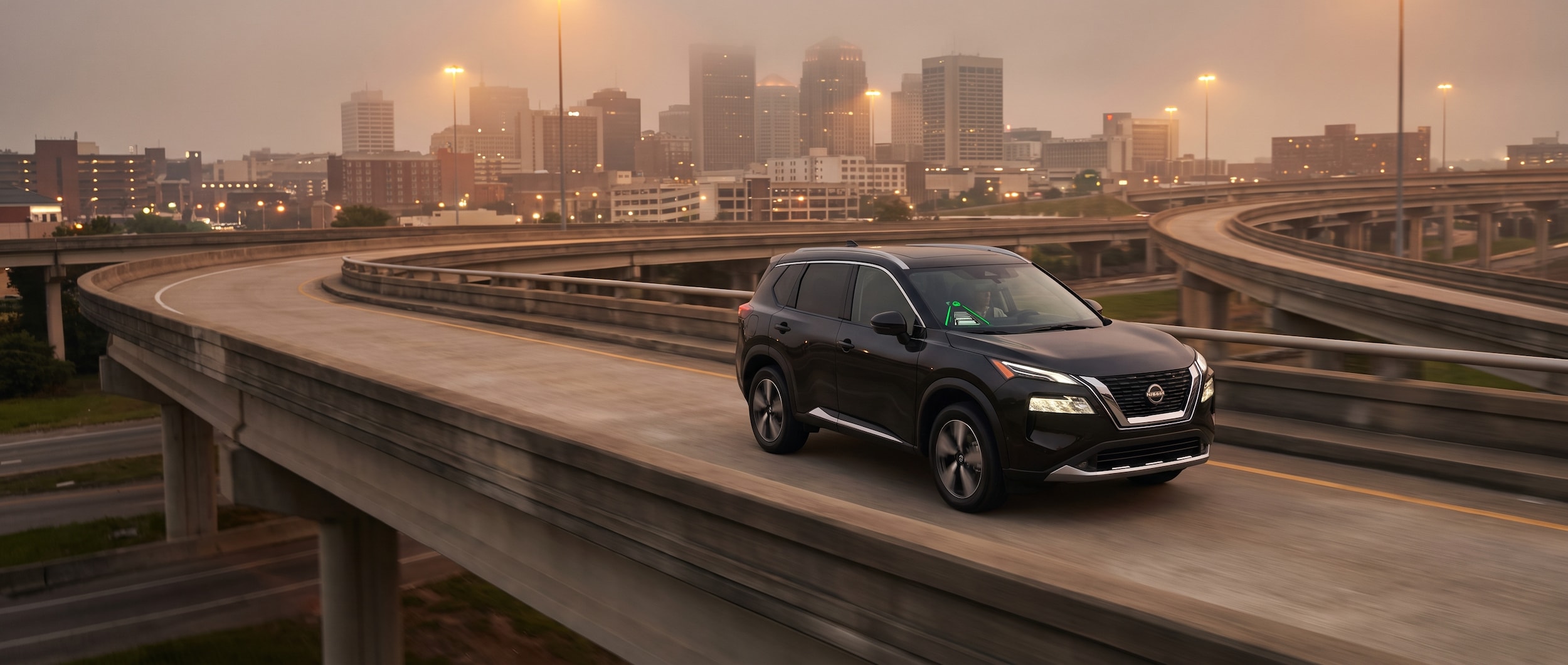 2026 Nissan Rogue with ProPILOT Assist active on I-65 in Birmingham Alabama at dusk
