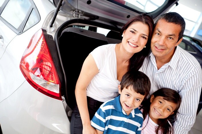 Family_In_Front_of_Car.jpg