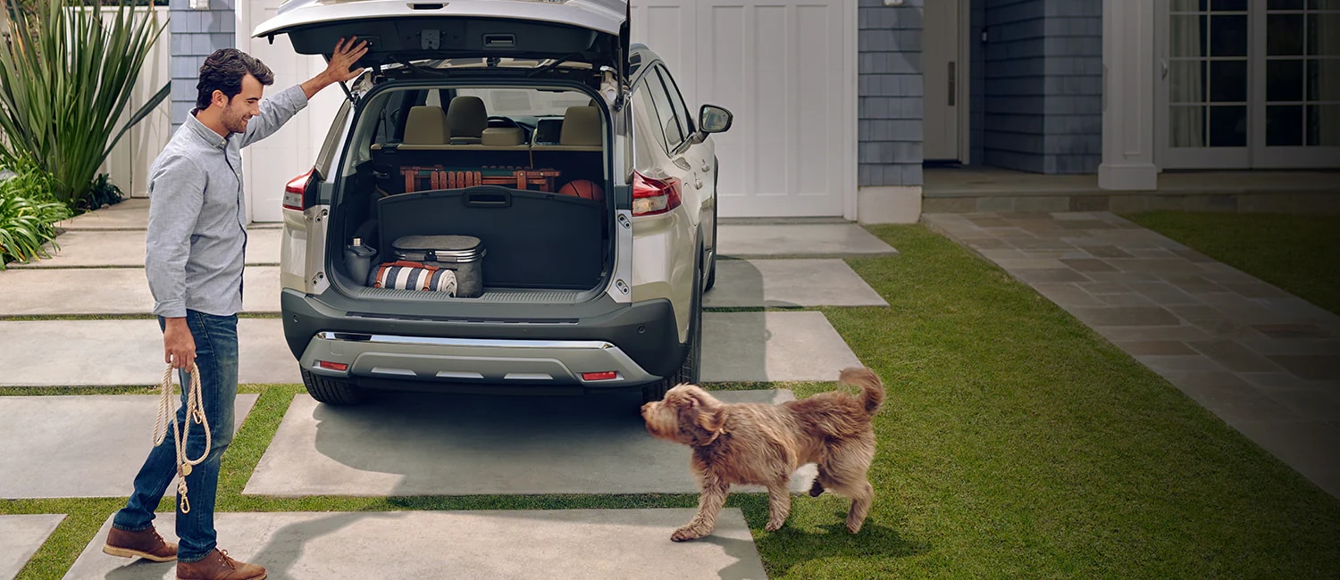 Nissan Rogue man with dog.png