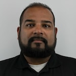 Staff member Peter Manikkam from ID_1271f9889458