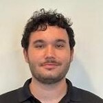 Staff member Mitchell Lambaiso  from ID_d71b7edb8e86