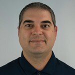 Staff member Chris	Hilliker from ID_1271f9889458