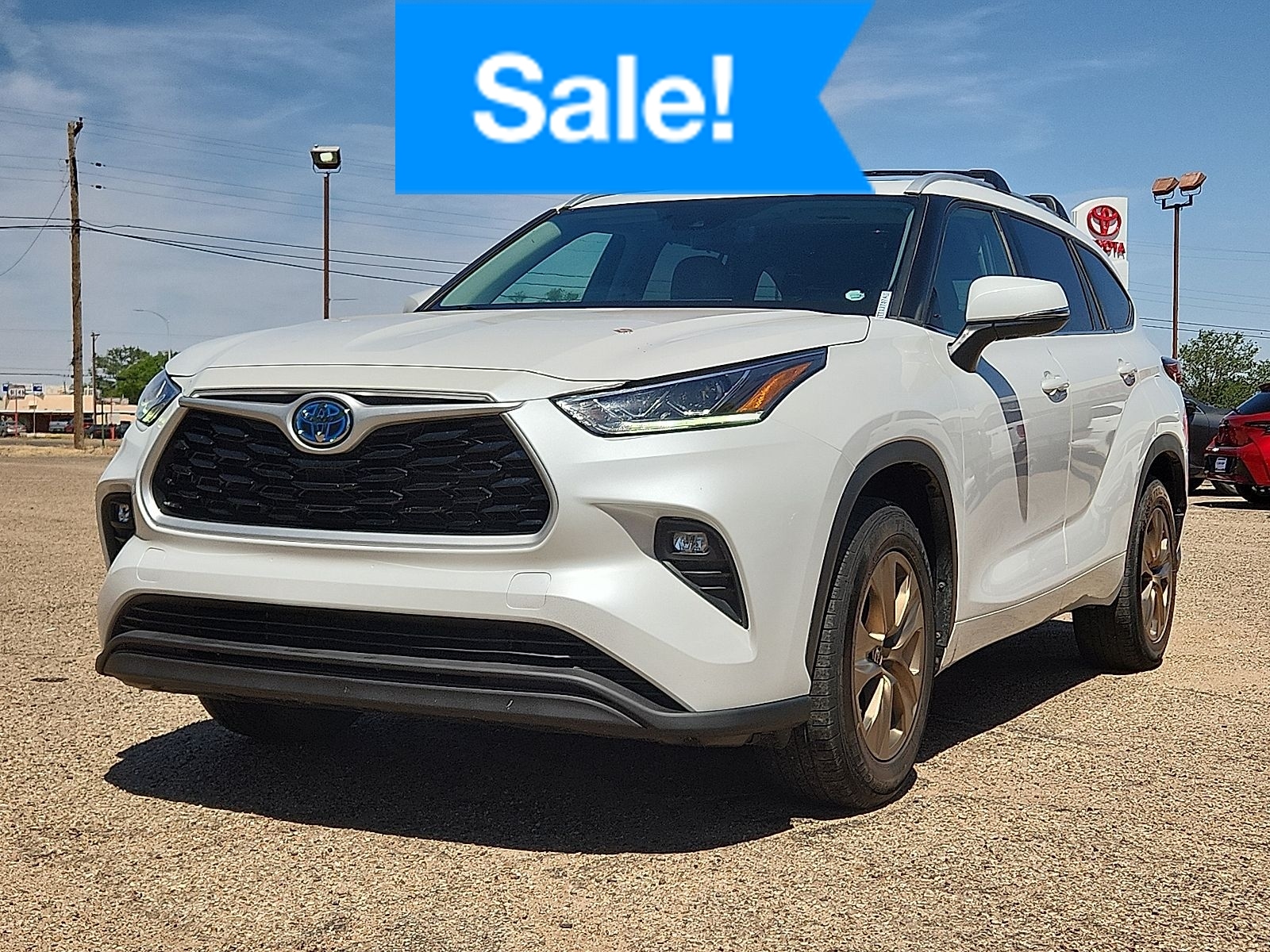 2023 Toyota Highlander Hybrid Bronze Edition FWD's photo