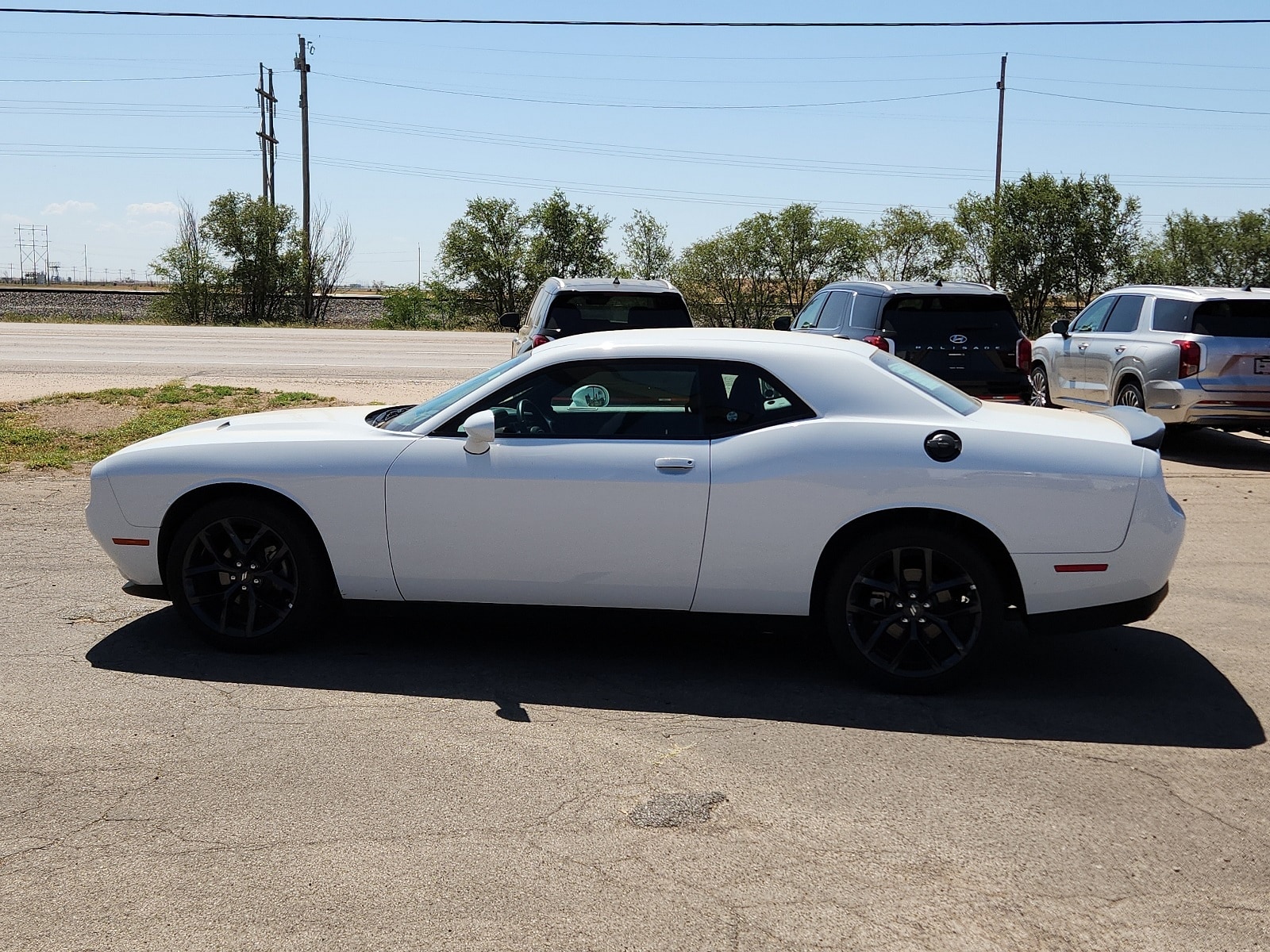 Used 2023 Dodge Challenger SXT with VIN 2C3CDZAG4PH696454 for sale in Portales, NM