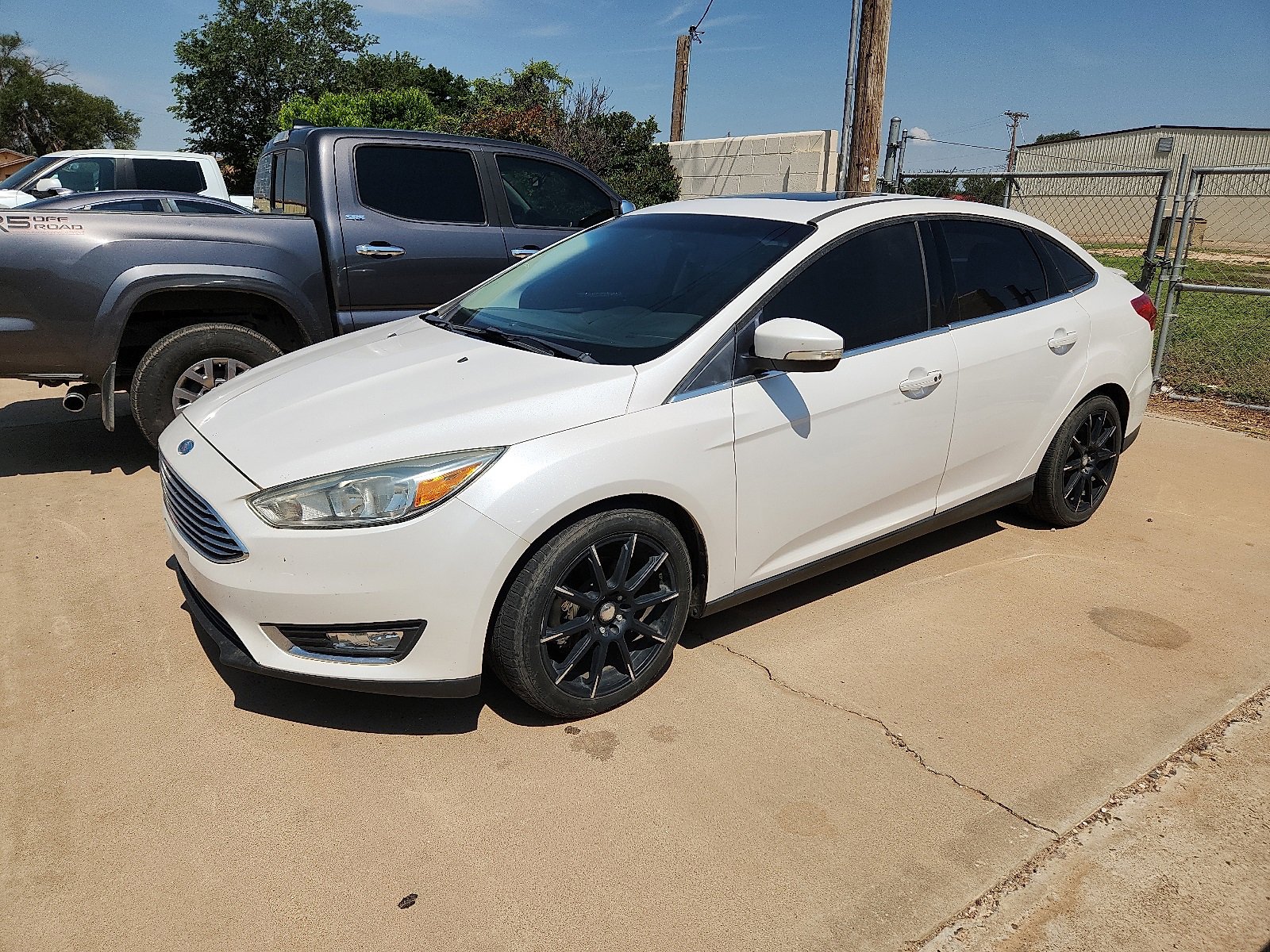 Used 2015 Ford Focus Titanium with VIN 1FADP3J29FL231488 for sale in Portales, NM