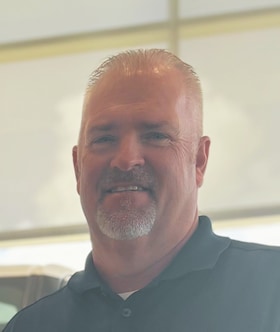 Staff member Adam Gates from a85d9e36cff6