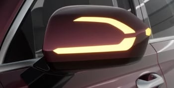 Auto-dimming side mirrors with turn-signal indicators