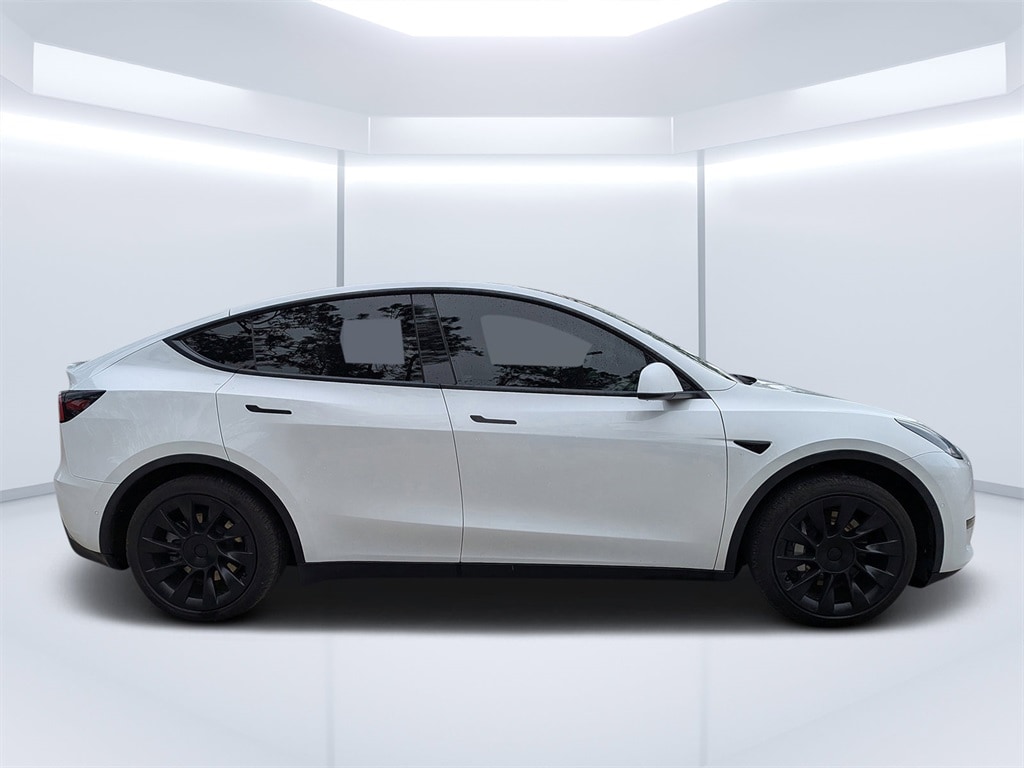 Used 2021 Tesla Model Y Standard Range with VIN 5YJYGDED1MF126229 for sale in Palm Coast, FL