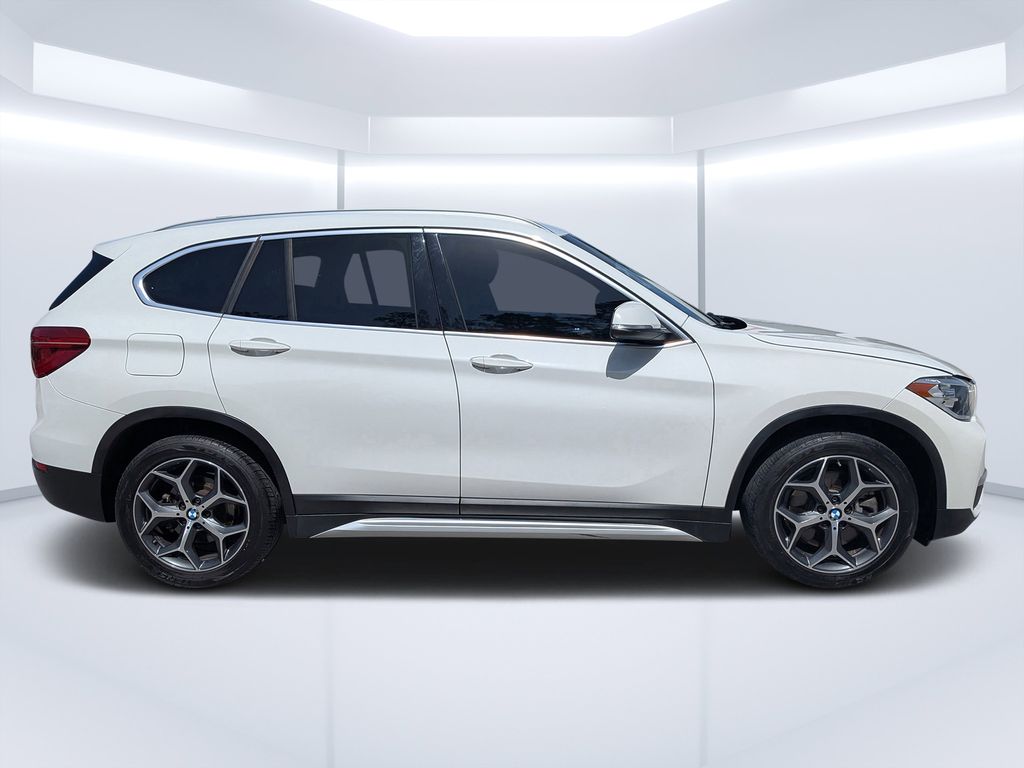 Used 2018 BMW X1 28i with VIN WBXHU7C34J5L07510 for sale in Palm Coast, FL