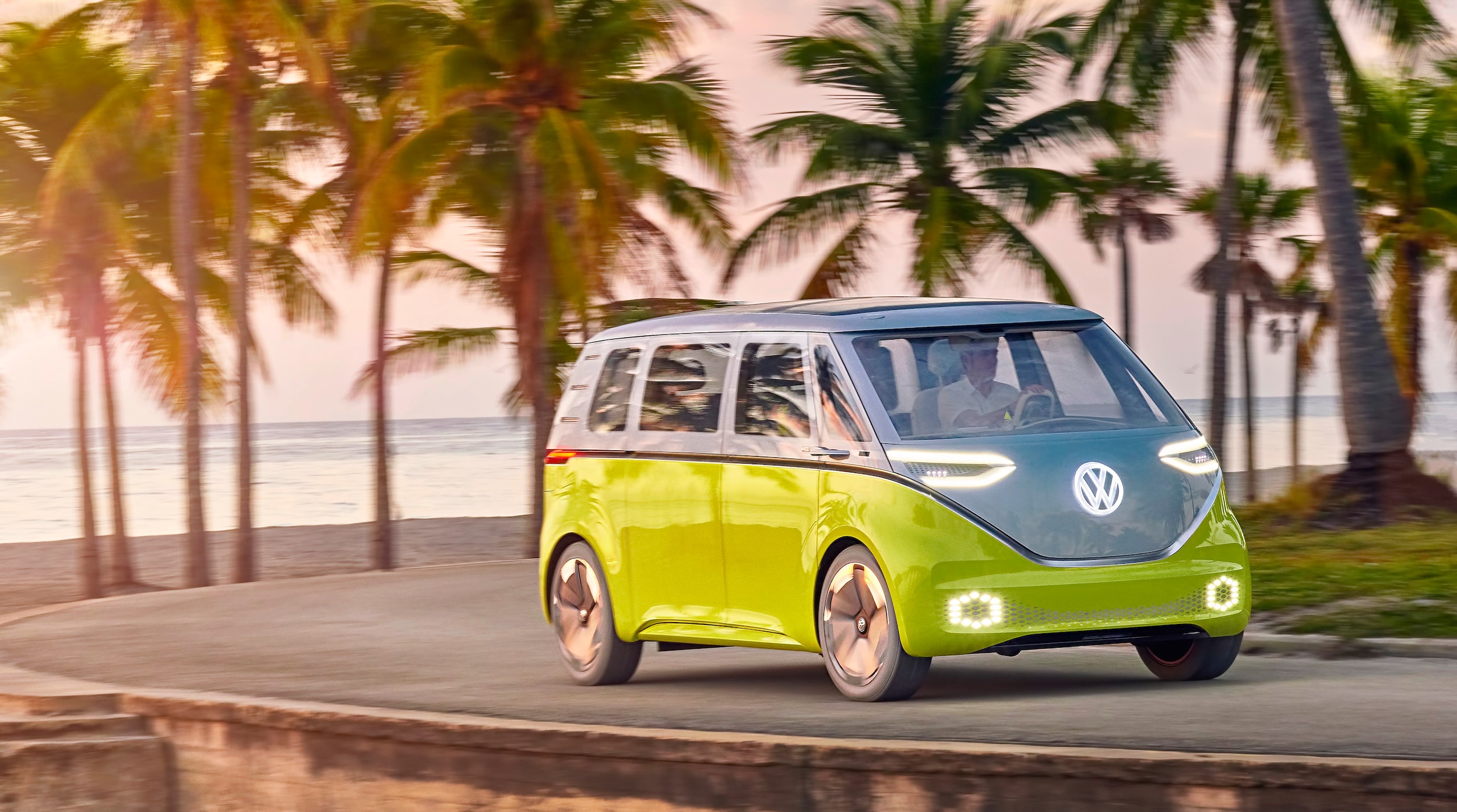 Vehicles of the Future: the ID., ID. CROZZ, and ID. BUZZ at Hanover Volkswagen  of Hanover | Green ID. BUZZ running on road