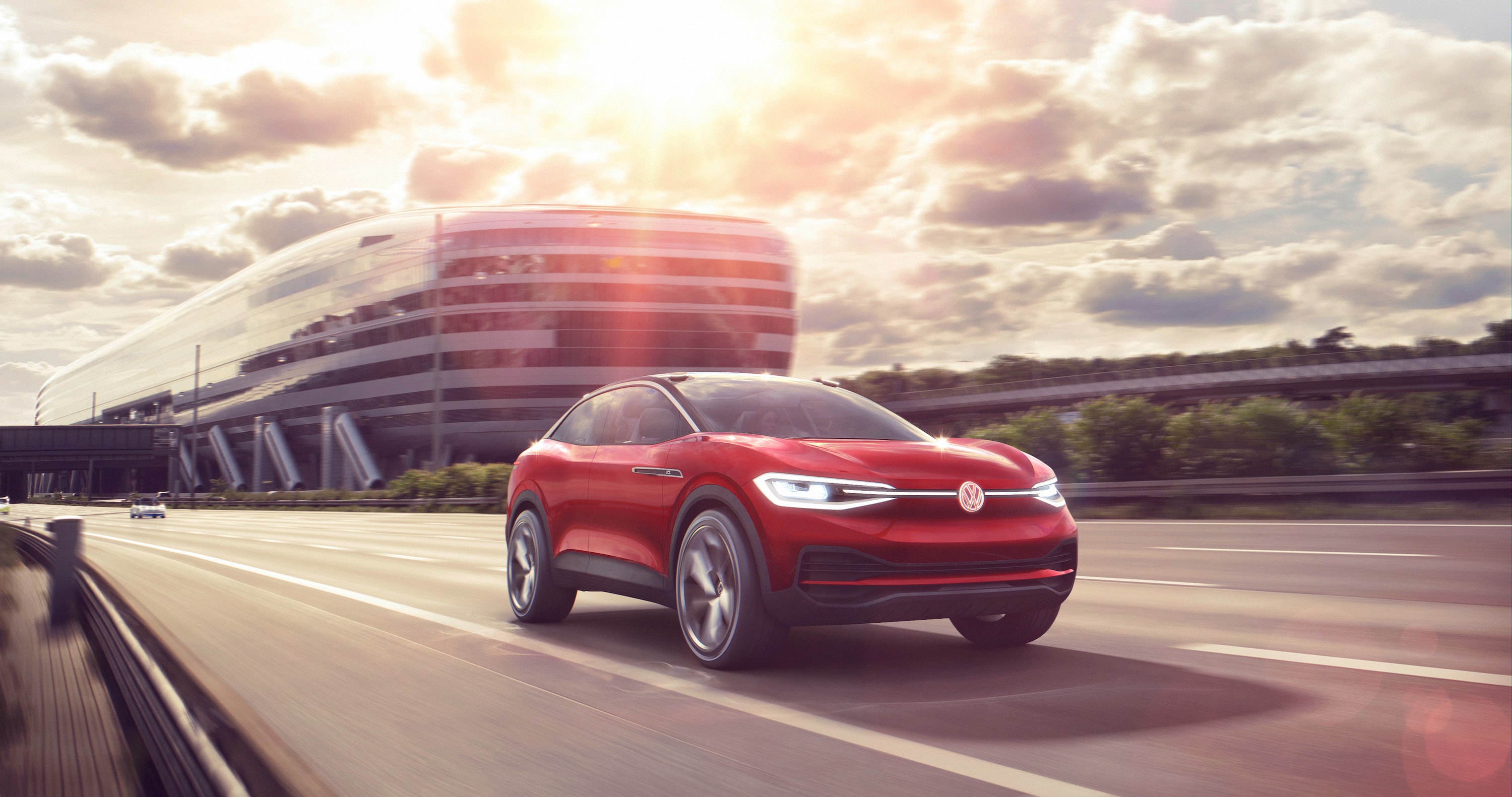 Vehicles of the Future: the ID., ID. CROZZ, and ID. BUZZ at Hanover Volkswagen  of Hanover | The red ID.CROZZ running on road