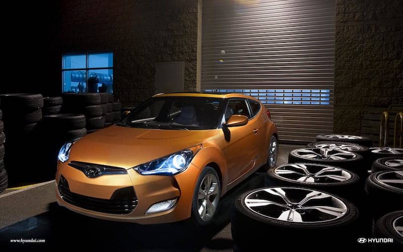 2017 Hyundai Veloster in Vitamin C, showing headlights