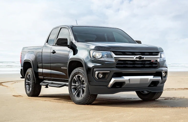 2022 Chevy Colorado black side view in the desert