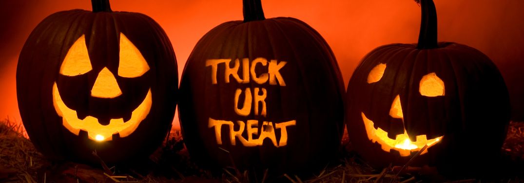 Three Halloween Jack-o-Lanterns with Faces and Trick or Treat Text