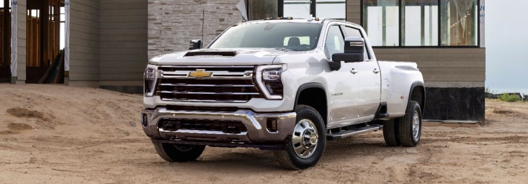 White 2024 Chevy Silverado HD in a Driveway