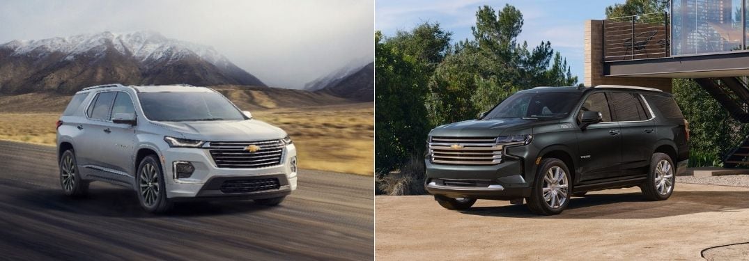 White 2022 Chevy Traverse Front Exterior on Country Road vs Black 2022 Chevy Tahoe Front Exterior in a Driveway