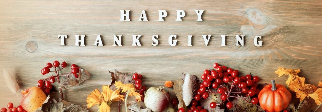 Fall Decorations on Board Background with Happy Thanksgiving Text