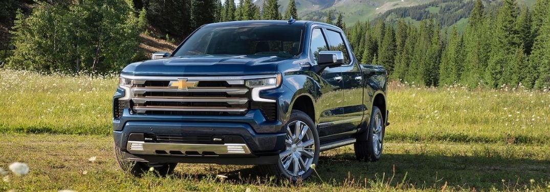 Blue 2022 Chevy Silverado High Country in a Field