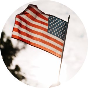 American Flag with Sun Behind