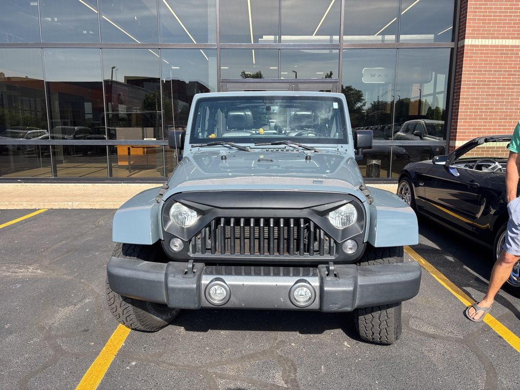 Used 2014 Jeep Wrangler Unlimited Sahara with VIN 1C4BJWEG7EL132967 for sale in Grandville, MI