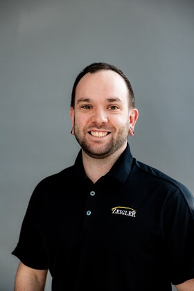 Staff member Cam Thompson from ID_a406223261c0