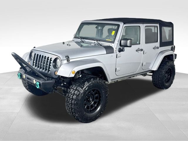 Pre-Owned 2013 Jeep Wrangler Unlimited Sahara