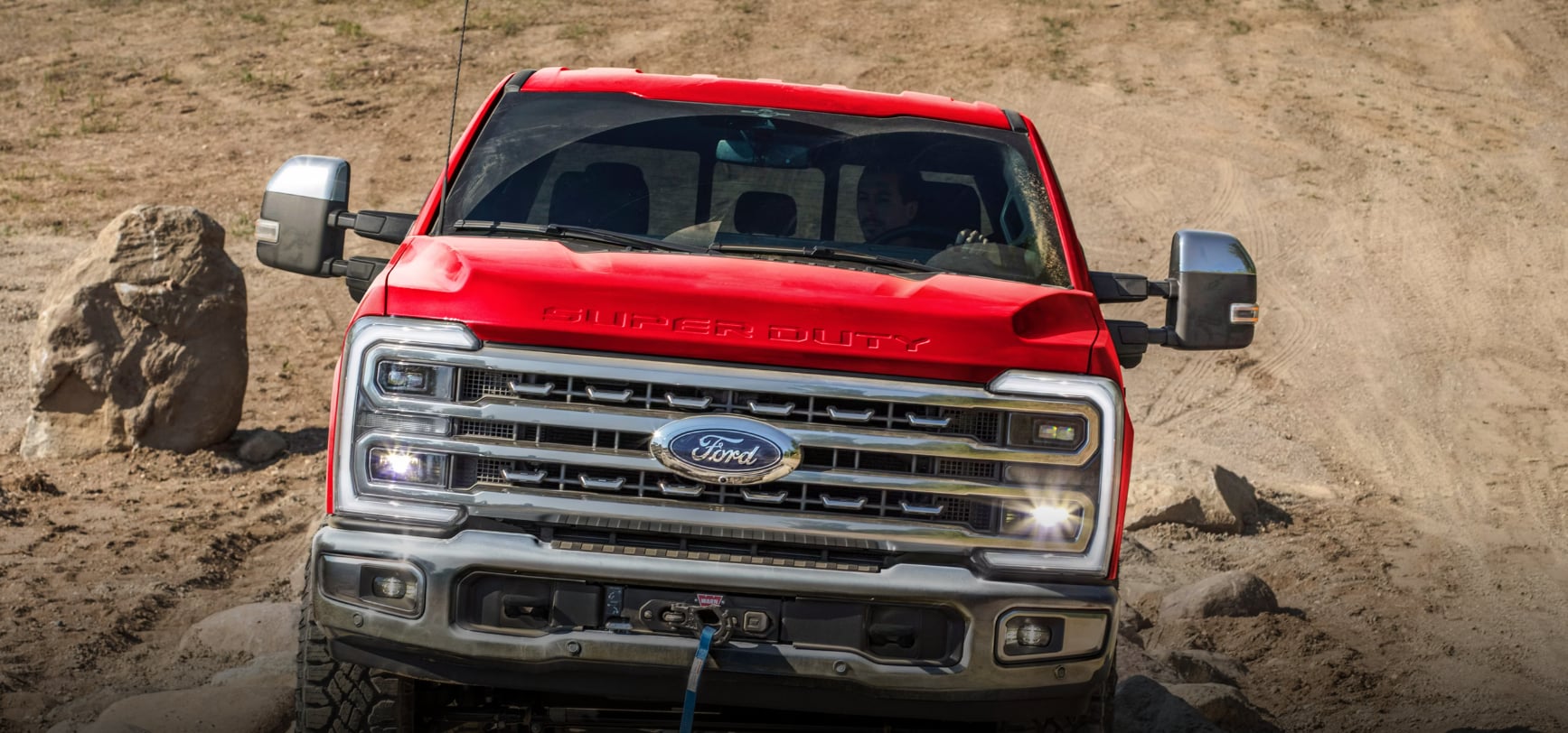  Person cheerfully signing documents.