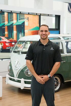 Staff member Jordan Natour from ID_190694