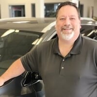Staff member Dennis Thompson from 80d1739b980f
