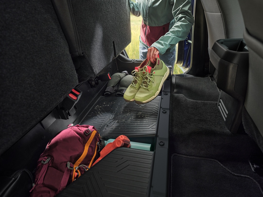  Person cheerfully signing documents.