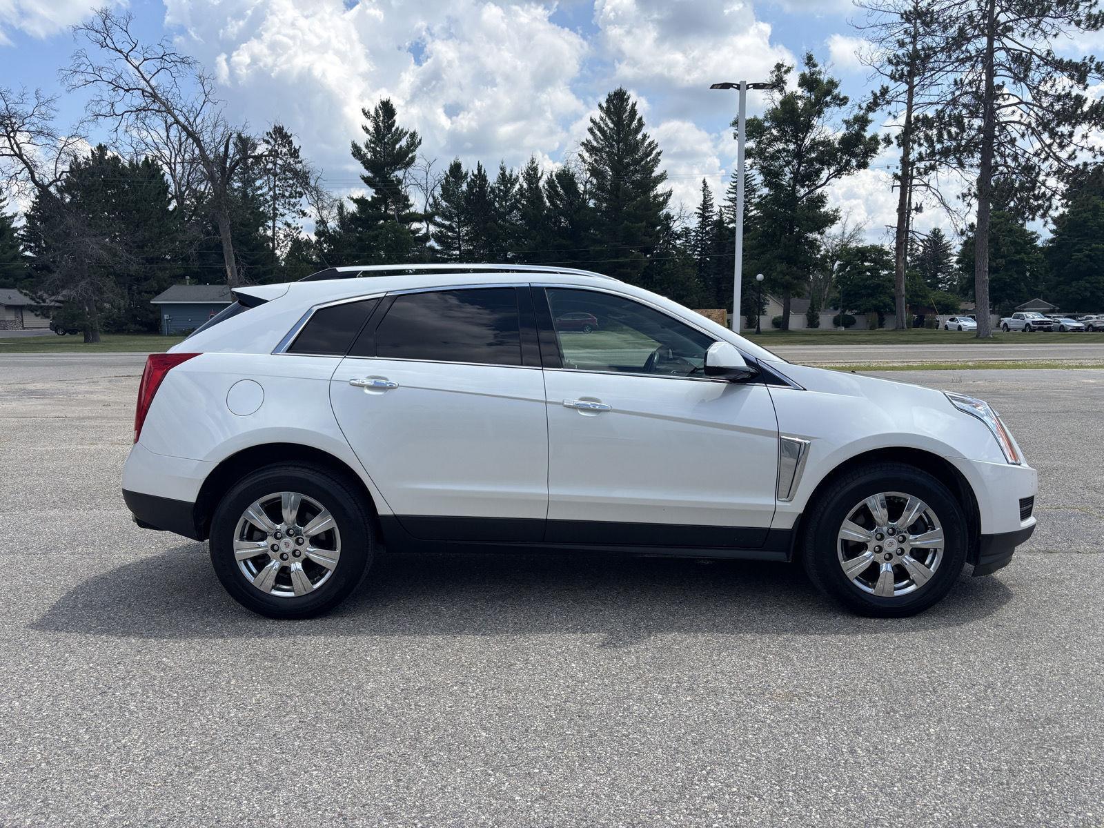 Used 2015 Cadillac SRX Luxury Collection with VIN 3GYFNBE34FS621473 for sale in Roscommon, MI