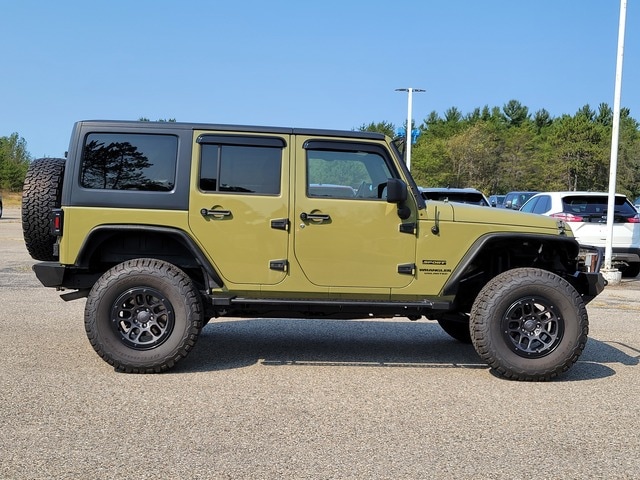 Used 2013 Jeep Wrangler Unlimited Sport with VIN 1C4BJWDG5DL690669 for sale in Roscommon, MI