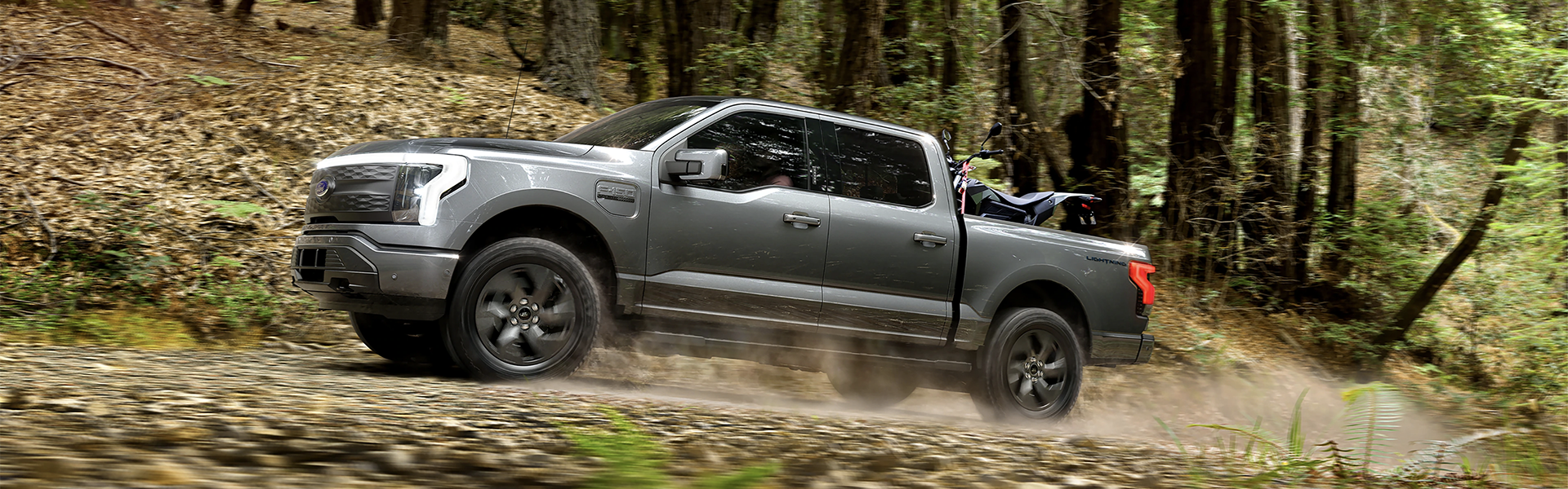 2022 Ford F-150 Lightning in the woods.