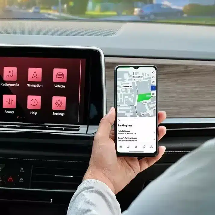The central infotainment screen showing wireless Apple CarPlay or Android Auto.