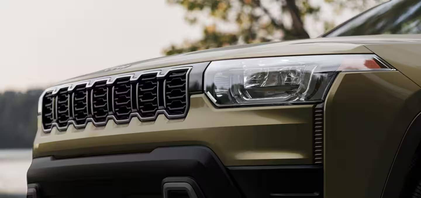 Side view of the 2026 Jeep Grand Cherokee showing its aerodynamic body and bold lines.