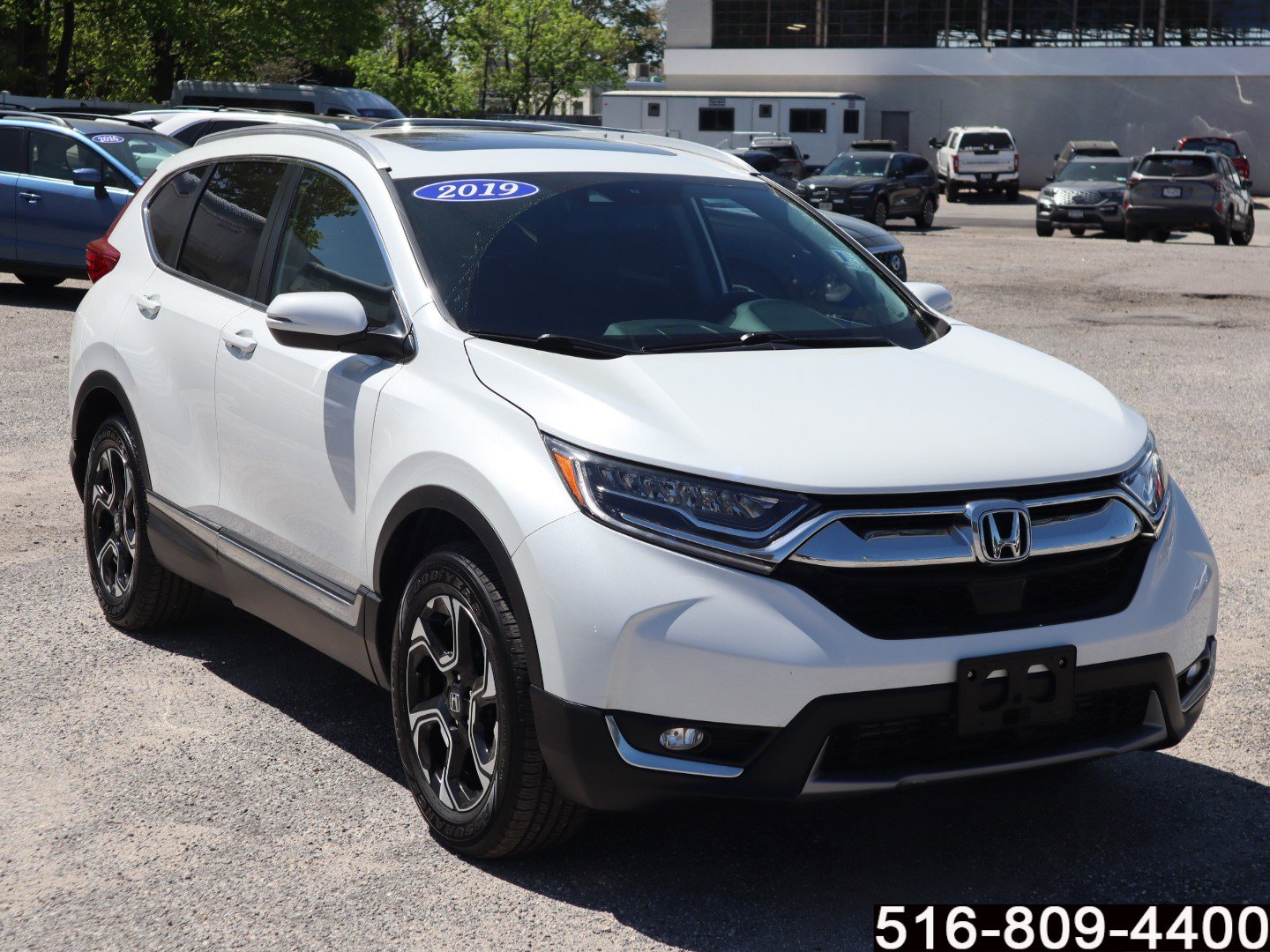 Used 2019 Honda CR-V Touring with VIN 7FARW2H97KE010375 for sale in Wantagh, NY