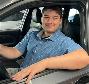 Staff member Jake Wells from ID_7e4bd55f1c87