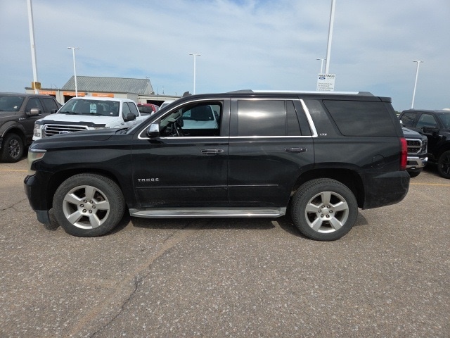 Used 2015 Chevrolet Tahoe LTZ with VIN 1GNSCCKC1FR205699 for sale in Hastings, NE