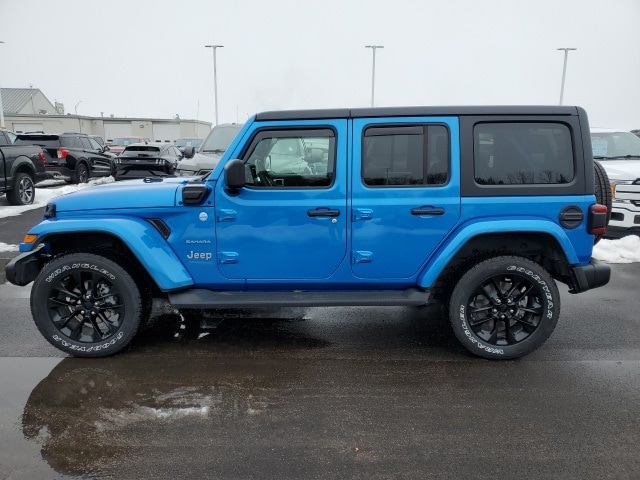 Used 2021 Jeep Wrangler Unlimited Sahara 4XE with VIN 1C4JJXP60MW803141 for sale in Hastings, NE