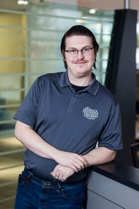 Staff member Nick Carson from ID_38d764ddddc0