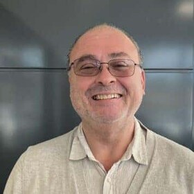 Staff member Ted Roman from ID_31834ffa9718