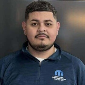 Staff member Adrian Carrera from ID_76e953b65a8d