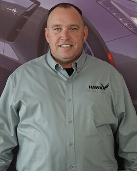Staff member John Glusak from ID_1b921177c60b