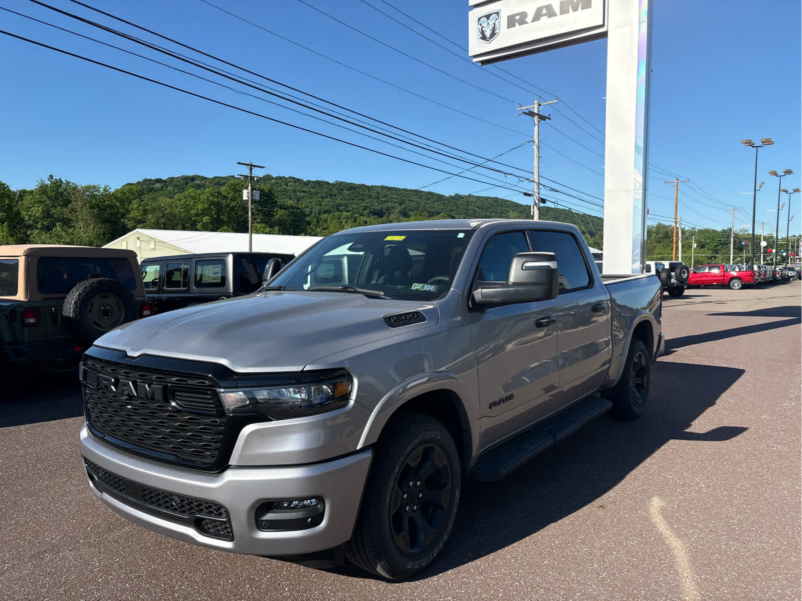2025 RAM 1500 Big Horn/Lone Star 4x4 Crew Cab 5'7's photo